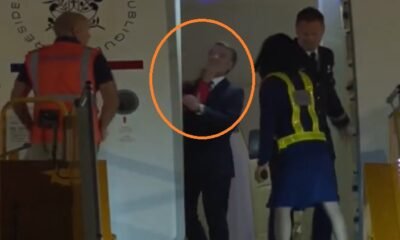 French President was slapped by his wife while getting off the plane, the incident was captured on camera