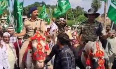 MP News: Two Chhatarpur police officers seen hoisting religious flags in Eid Milad-un-Nabi procession, SP issued show cause notice